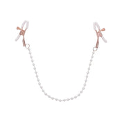 Pezoneras con cadenas y perlas - ajuste regulable - unión de pezones - doble - bdsm - perlas sintéticas - oro rosado - blanco - gomas antideslizantes - accesorio sexual - sumisión - estética femenina - sexshop -dominame - chile - santiago 